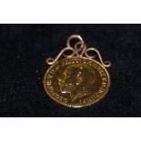 1911 mounted half sovereign 4.6 grams total weight