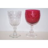 Victorian cranberry glass goblet, large proportion, together with an Edinburgh Crystal goblet