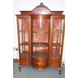 Edwardian inlaid mahogany bow-fronted cabinet, two