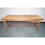 Victorian pine refectory table on turned supports,