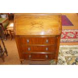 A fitted art deco writing bureau