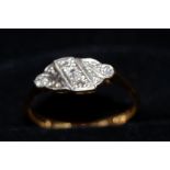 18ct gold ring set with 3 small diamonds in a plat