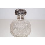 Early silver topped perfume bottle