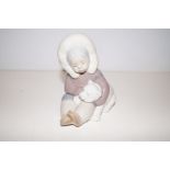 Lladro figure of girl with polar bear height 14cm