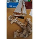 Model boat together with an anchor
