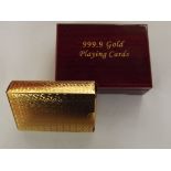 Set of gold plated playing cards with case