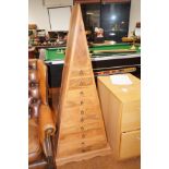 Unusual graduating set of 10 drawers. Height 146cm