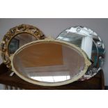 Three ornate wall mirrors, one being a 1930's fram