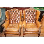 2 Chesterfield style wingback chairs