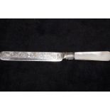 Silver butter knife with mother of pear handle