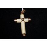 Gold mounted ivory cross unmarked but tested for h