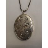 Silver necklace with locket pendant