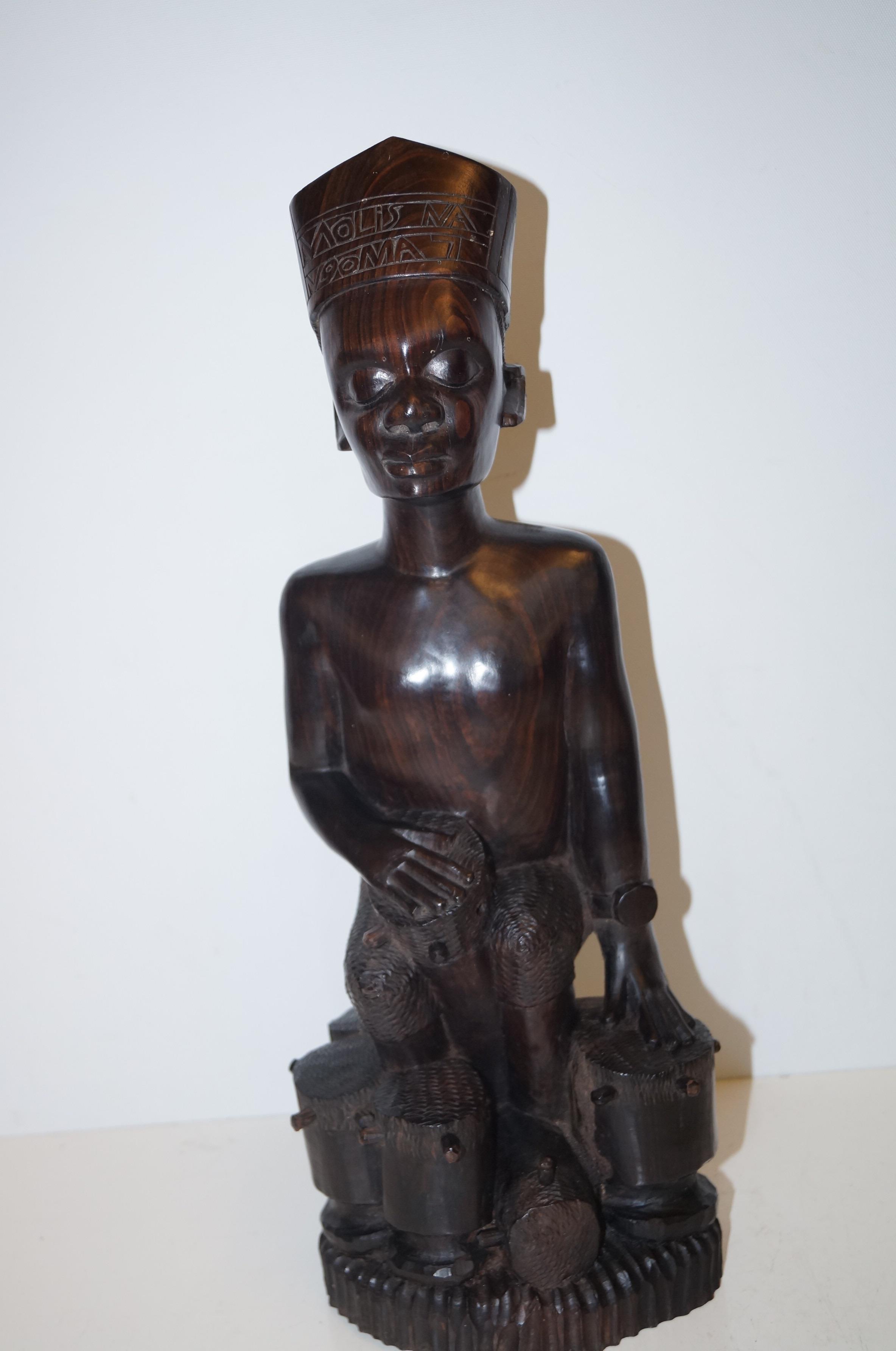 Carved African wooden figure. Height 44cm