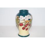 Moorcroft fruiting Cherry Blossom Vase. Height 17c