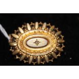 Part gold with central diamond mourning brooch