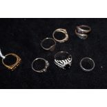 A collection of 7 silver rings