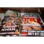 Eight boxing posters, each signed by Amir Khan