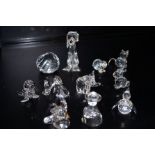 Group of twelve Swarovski figures, a/f to dogs ear