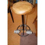 Cast iron peddle stool with leather seat