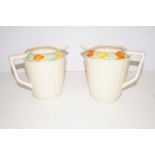 Pair of Arthur Wood water jugs, height 15cm