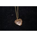 9ct gold chain and heart shaped pendant locket 3.