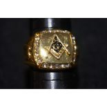 Yellow metal Masonic ring set with 20 white stones