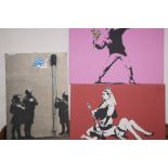 Three Banksy wall canvases