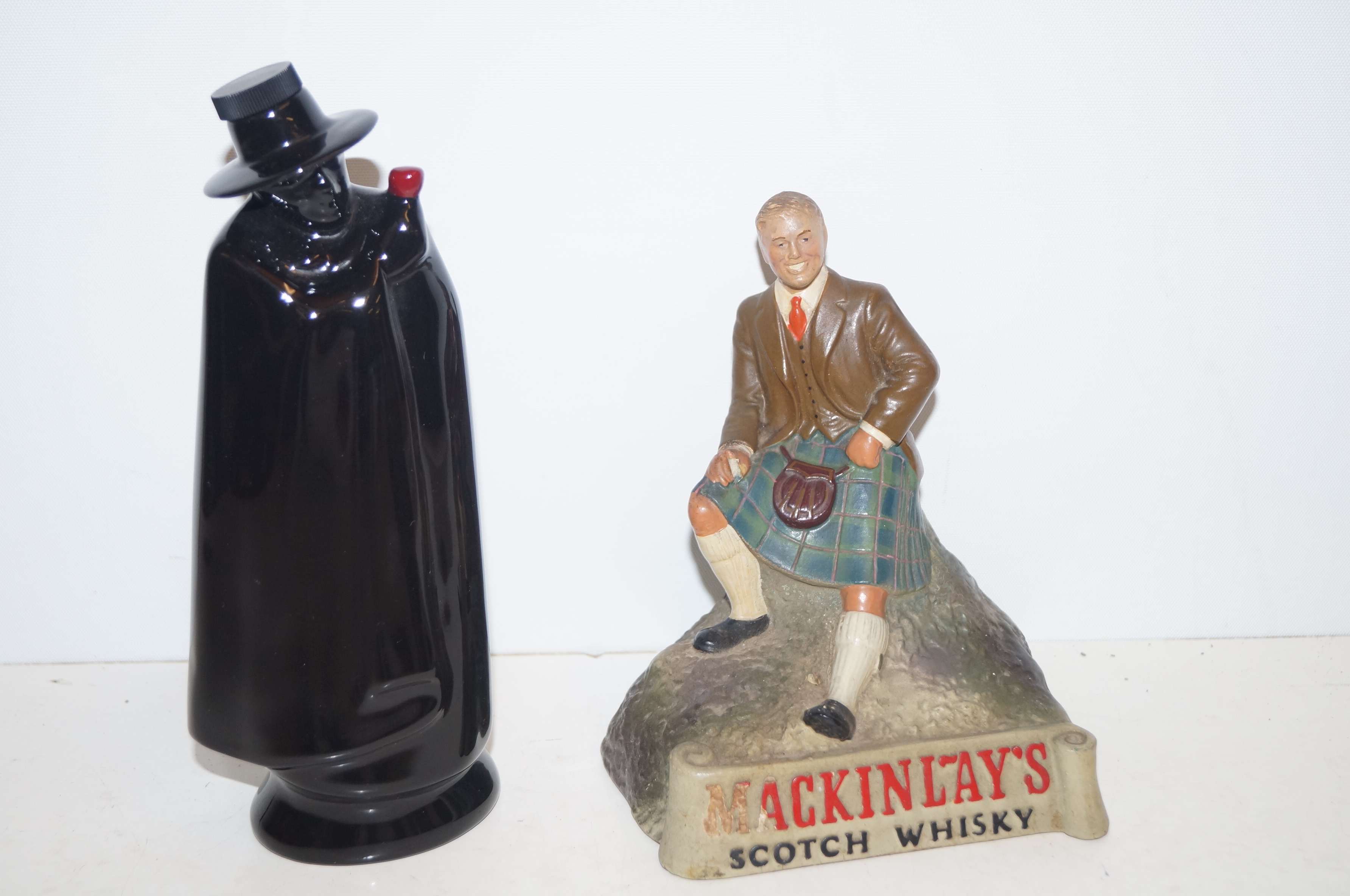 Wade Sandeman decanter and a scotch whiskey advert