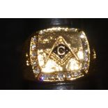 Yellow metal Masonic ring set with 20 white stones