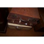 Three vintage suitcases