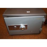 Heavy duty combination safe, with key. (Key and co