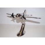 Chrome model of a plane