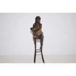 Bronze nude sitting on a chair 28cm