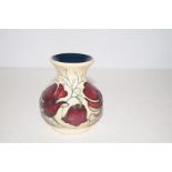 Moorcroft chocolate cosmos vase. Height- 10cm