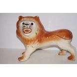 Victorian ceramic figure of a lion. 33cm