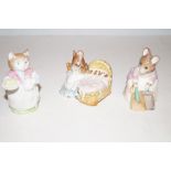 Three Beswick Peter Rabbit figures one with gold b