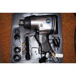 Cased impact wrench and accessories