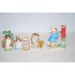 Four Peter Rabbit figures. Two Beswick, one Royal