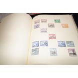 Nice old blue spring back stamp album, containing