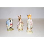 Three Beswick Peter Rabbit figures