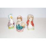 Three Beswick Peter Rabbit figures one with gold b