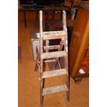 A set of vintage step ladders