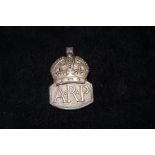 Silver A.R.P cap badge.