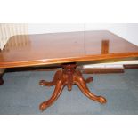 Victorian tilt top dining table, with bulbous pedestal over four down-swept scrolled legs