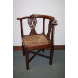 Late 18th century oak corner chair with rush seat