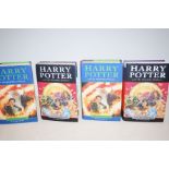 Four Harry Potter first edition books