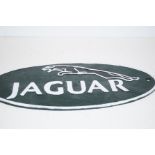 Cast iron jaguar sign