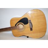 Yamaha acoustic guitar with soft case