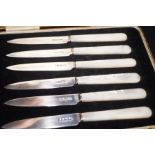 Set of six silver desert knives, with mother of pe