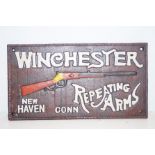 Cast iron Winchester Sign. Dimensions 17cm x 31cm